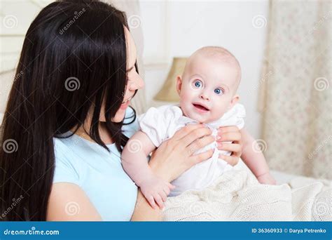 Smiling Mother With Six Month Old Baby Girl Indoor Stock Image Image