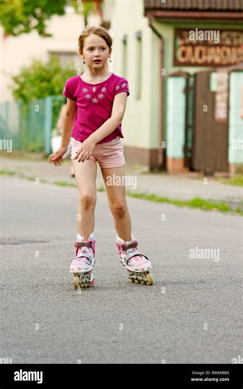 Girl On Rollerblades Stock Photo Alamy