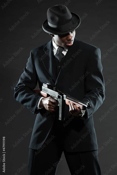 Black American Mafia Gangster Man In Suit With Gun Stock Photo Adobe