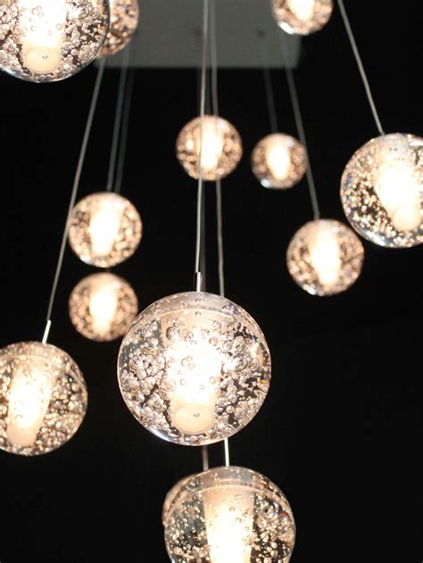 Bespoke feature glass globe chandelier | Glass globe chandelier, Globe chandelier, Glass globe