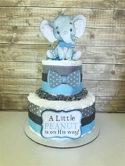 From traditional tiered diaper cakes to modern shaped diaper cakes there is the one that will catch your eye. Elephant Diaper Cake for Boys - Little Peanut Baby Shower ...