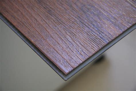 It is a particular type of luxury vinyl tiles that click together. China Laminate Vinyl Tile of Click System Photos ...