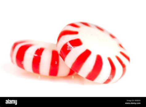 Two Pieces Of Red And White Peppermint Christmas Candy Stock Photo Alamy