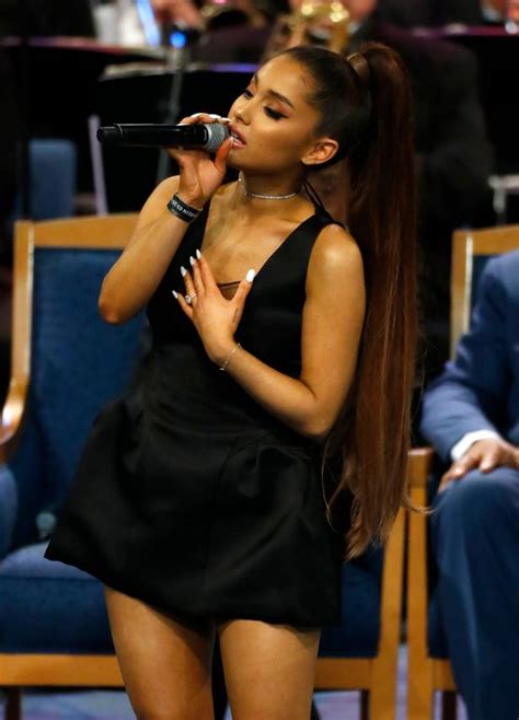 bishop apologises to ariana grande after social media row over way he touched her at funeral