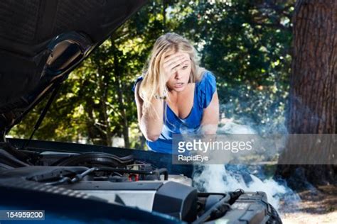 Beautiful Blonde Stranded By Broken Down Car Is Helpless High Res Stock