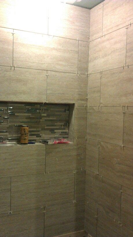 Contrary to popular belief, using large tiles in a small bathroom can in fact make your bathroom appear larger. 12x24 horizontal tile brick pattern shower | work ...