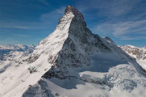 Aerial View Of Majestic Matterhorn Mountain In Front Of A Blue Sky
