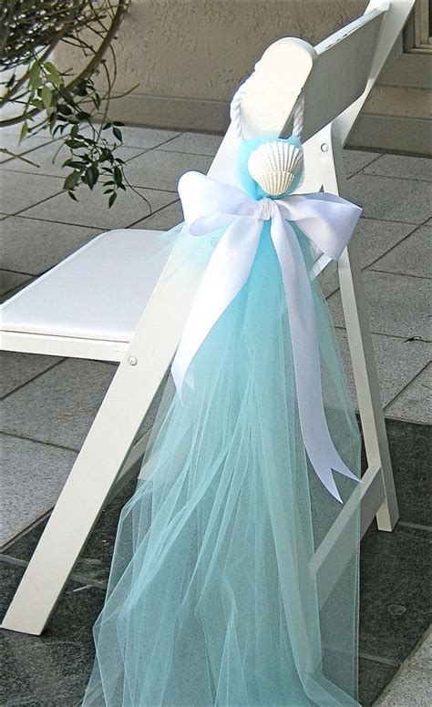 Beach weddings are a popular summer wedding theme, and for good reason! Beach Wedding Decor Chair Decorations by ...