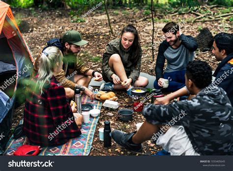 Friends Camping In The Forest Together Royalty Free Stock Photo
