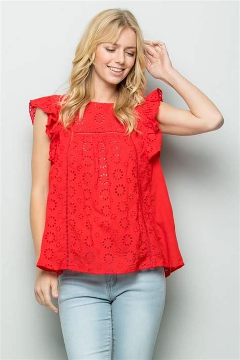 This Eyelet Top Is Sure To Turn Heads With Its Bright Red Color This Sleeveless Top Features A