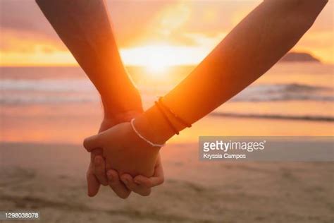 Two Hands Clasped Together Photos And Premium High Res Pictures Getty