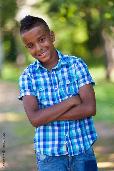 Outdoor Portrait Of A Cute Teenage Black Boy African People Stock