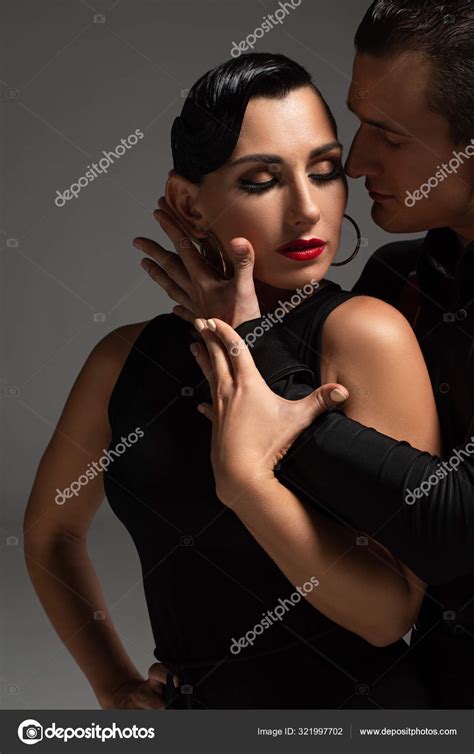 Sensual Dancer Hugging Passionate Partner While Performing Tango