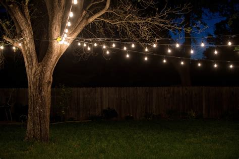 At night my backyard looks like a scene from avatar. Domestic Fashionista: Industrial Vintage Backyard Lighting