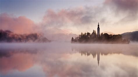 Castle In Island At Distance During Foggy Season Hd Wallpaper