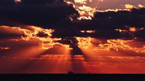Download Wallpaper 1600x900 Sunset Sea Clouds Dark