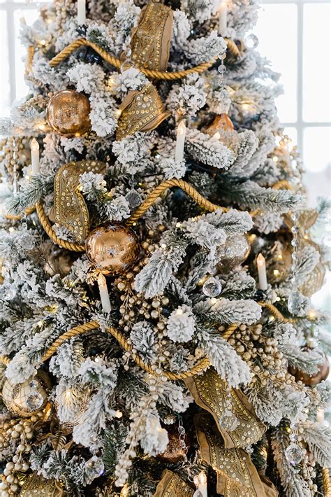 6 Ideas For How To Decorate A Flocked Christmas Tree