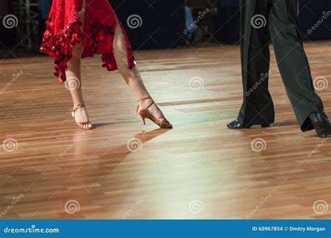 Closeup Of Legs Of Two Professional Dancers Performing Latin Am Stock