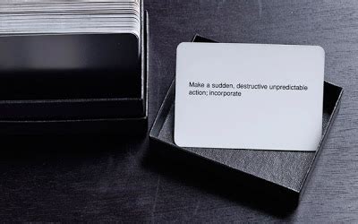 Black box with unnumbered cards. brian eno's oblique strategies cards | tomorrow started