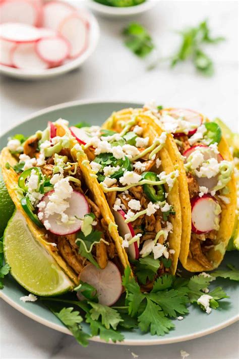 We keep it on the bones while it cooks to help infuse more flavor into the lean chicken breast meat. Instant Pot Shredded Chicken Tacos {Crowd-Pleasing ...