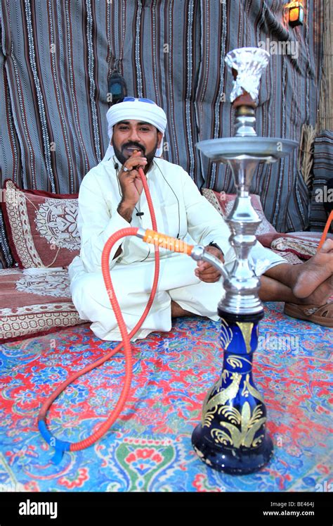 Men Smoking Water Pipes Or Shisha Fotos Und Bildmaterial In Hoher