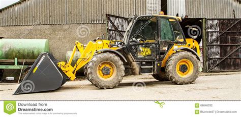 Construction Digger Loader In Farm Yard With Barn Editorial Photography