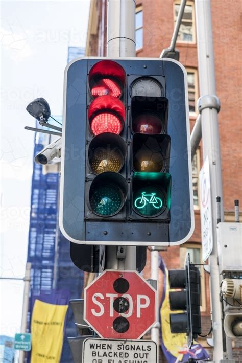 Image Of Traffic Light Signal With Green Cycle Lamp And Red Stop And