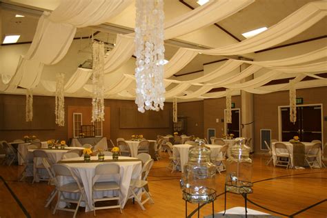 White Basic Tablecloths With Burlap Runners In An Lds Cultural Hall