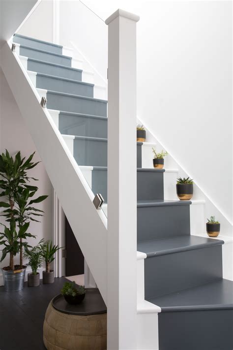 Spiral stairs are the perfect solution to discretely access your attic safely. Plants on the stairs! The perfect accessory. This interior ...