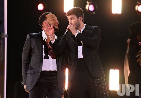 photo john legend and sebastián yatra perform at the latin grammy awards in las vegas