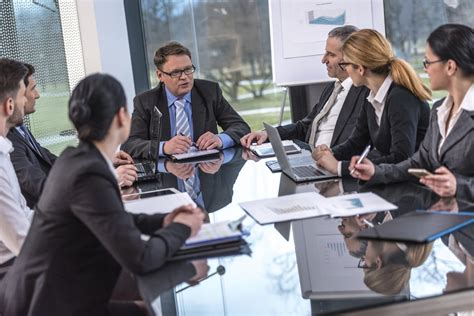 group of lawyers business people at conference table - WorkLife Law