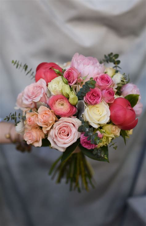 Medium Round And Controlled Bridal Bouquet Featuring Peonies Roses