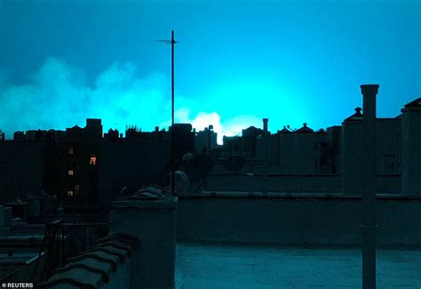 New York Skyline Bathed In Blue Light After Power Plant Explosion