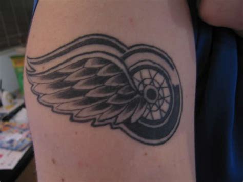 Saved by eric n amy. Detroit Red Wings tattoo