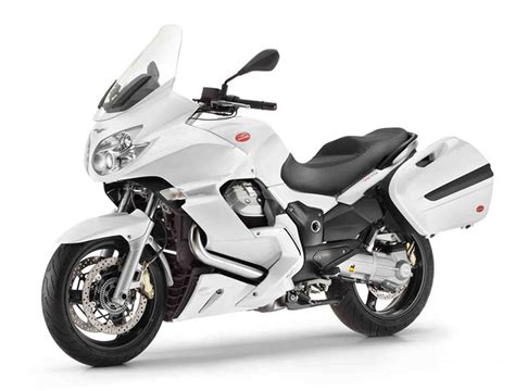 This latest version can boast the careful attention paid to achieve a more silent and smooth running of the engine, whilst tweaking the electronic control, timing system, cooling and exhaust system. 2013 Moto Guzzi Norge GT 8V Review - Top Speed