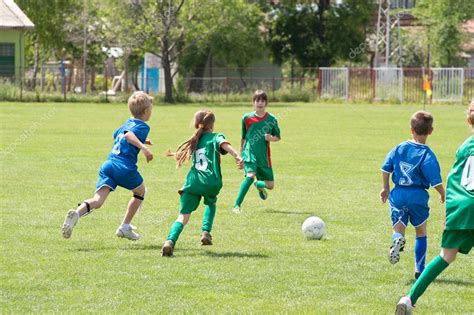 Children Playing Soccer — Stock Photo © Fotokostic 10724959