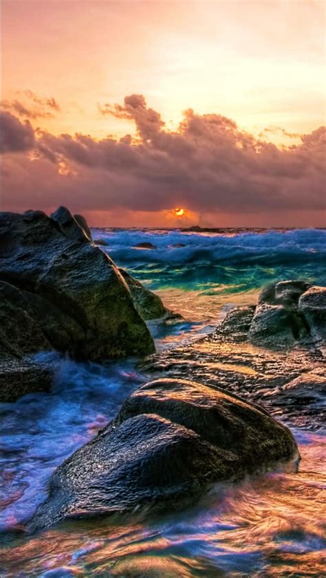 Stones Rocks On Beach Waves During Sunset Under White Clouds Sky 4k Hd