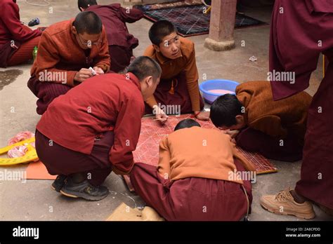 Buddhist Monks Practicing Drawing A Mandala Inside Sakya Monastery