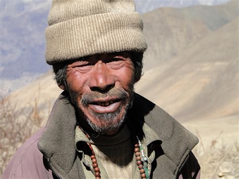 Old Man In Nepal With A Weather Beaten Face Image Free