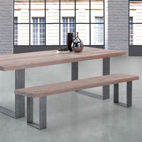A small dining bench makes a cozy breakfast nook at the kitchen table, while a long dining bench is most appropriate for tables that seat bigger groups. Building a wooden dining bench with steel legs. | DIYnot ...