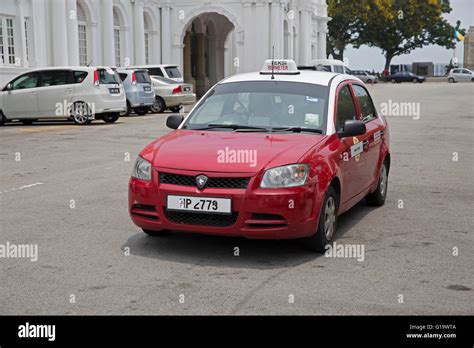 A Red And White Taxi In Penang Malaysia Stock Photo Alamy