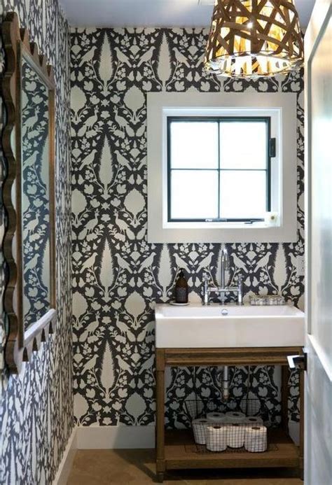 Funky Contrasting Dark And Light Wallpaper In The Powder Room With