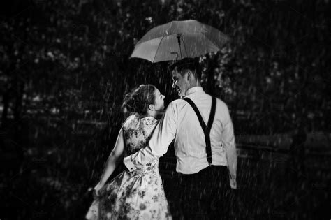 Couple In Love Flirting In The Rain High Quality People Images