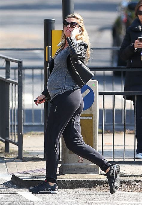 heavily pregnant abbey clancy emphasises her bump in tight jersey top daily mail online