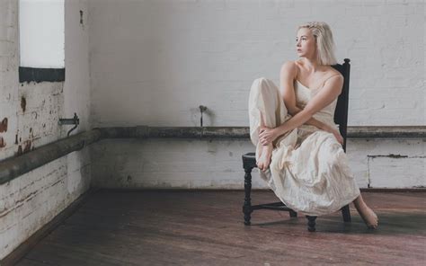 wallpaper chair dress sitting blonde barefoot women room 1680x1050 wallpapermaniac