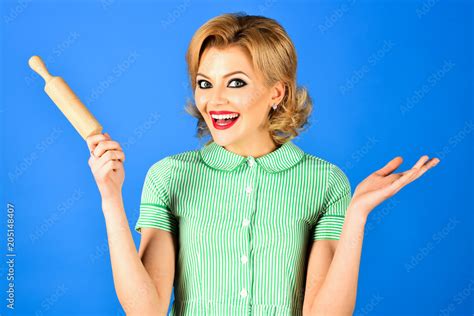 Woman In Pin Up Style Holds Rolling Pin Smiles Beautiful Pinup Girl