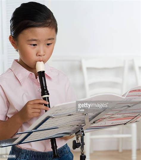 Boy Playing Recorder Photos And Premium High Res Pictures Getty Images