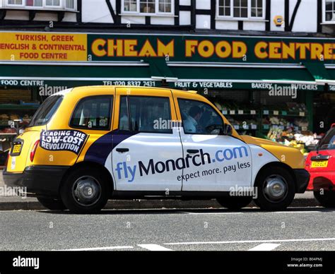 Taxi With Advertisement Cheam Surrey England Stock Photo Alamy