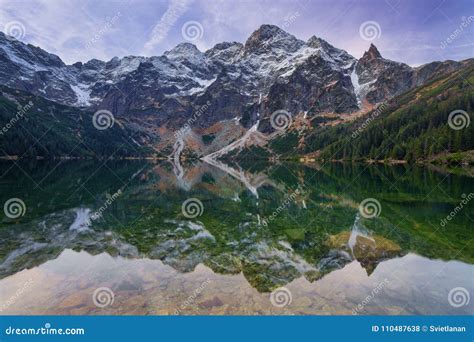 Rocky Mountains Reflection In The Calm Lake Water Stock Photo Image