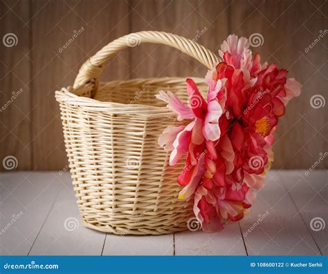 Beautiful Basket Is Decorated With A Flower Arrangement Stock Photo